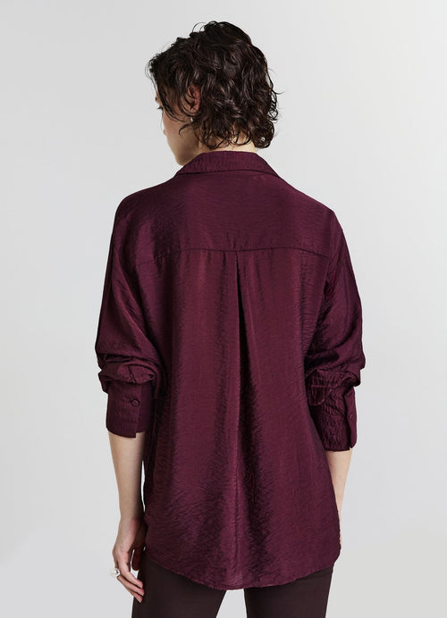 Camisa oversize con adornos