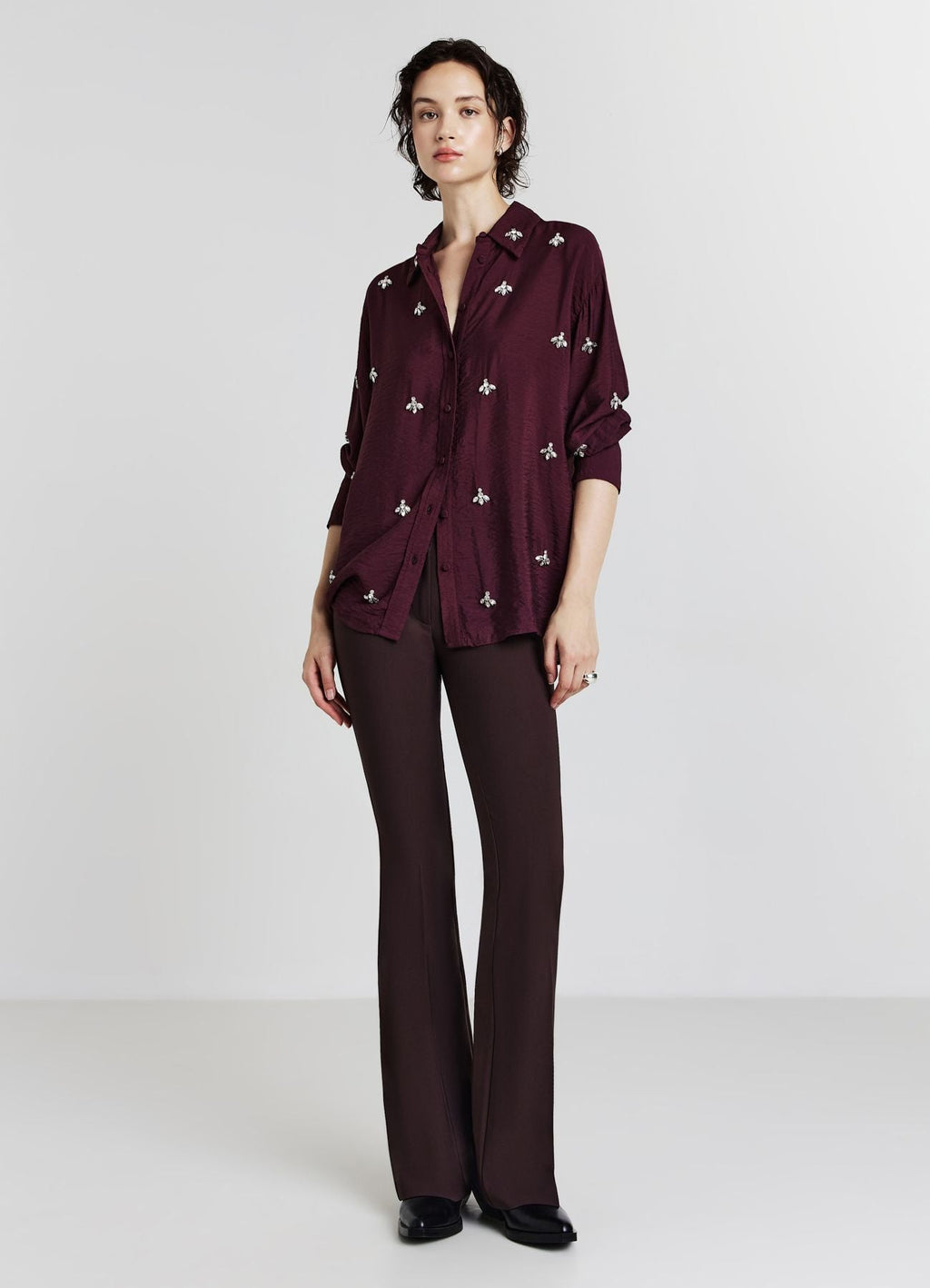 Camisa oversize con adornos