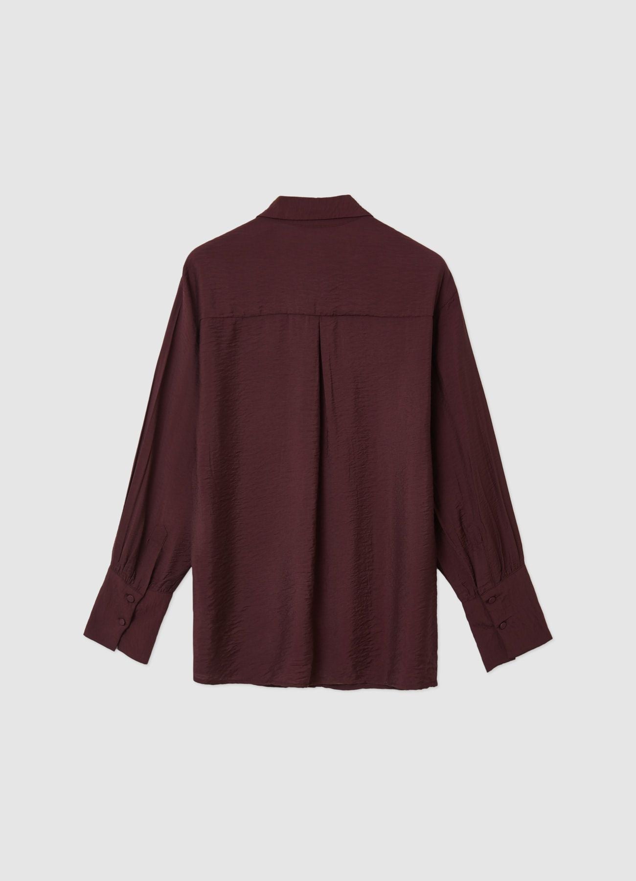 Camisa oversize con adornos
